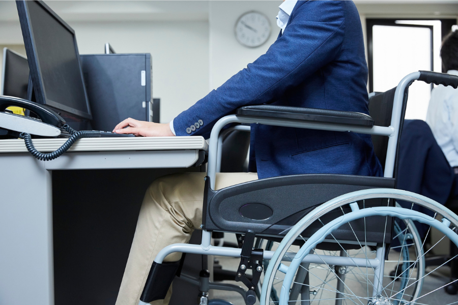 Employee working in a wheelchair