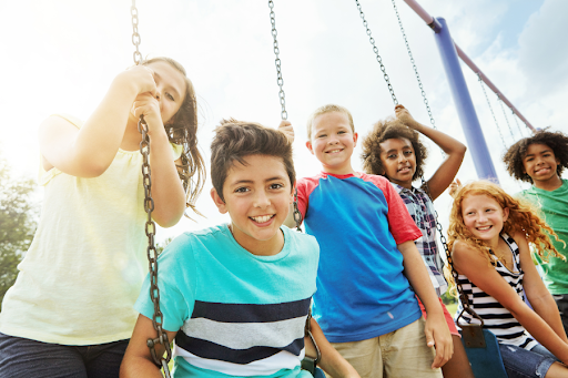 Children playing on swingset